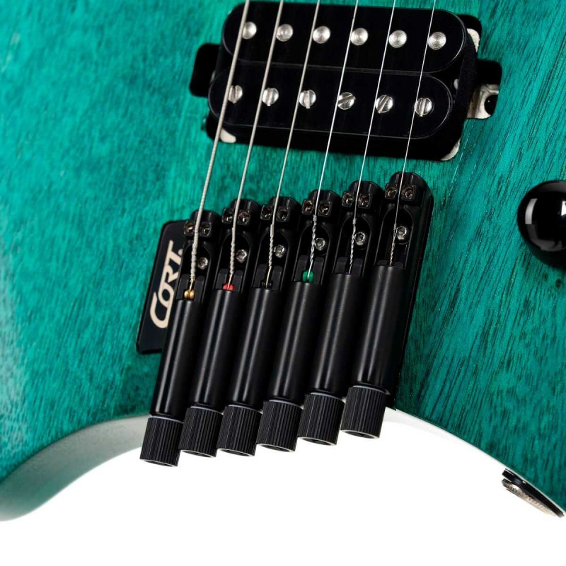 ADAG-1005303 Cort SPACE G6MS SGTQ Guitarra Eléctrica Headless con funda Semi Gloss Turquoise