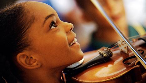 kid playing violin